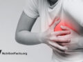 woman holding breast