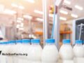 bottles of milk in the factory