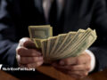 man holding money