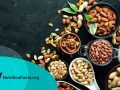 Assorted nuts on black background