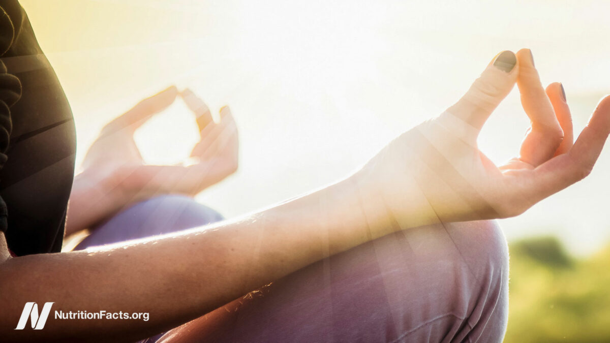 Woman in a meditative sitting stance